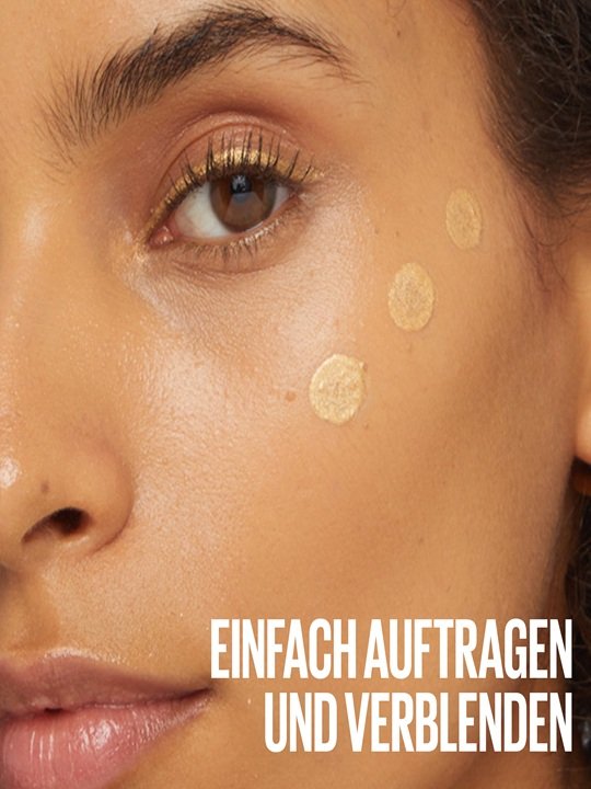 Gesicht einer Frau auf deren Wange drei Punkte Concealer zum highlighten aufgetragen sind